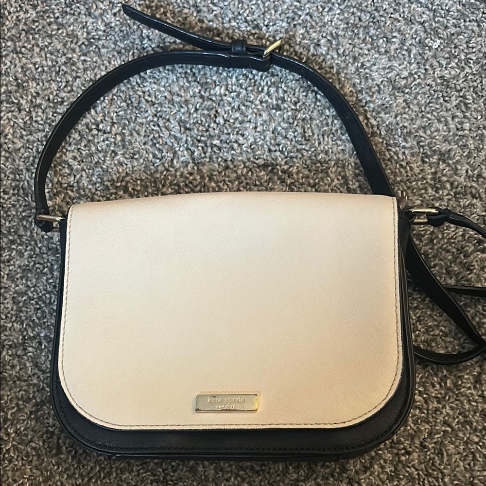 Kate Spade Cream and Black Crossbody Bag with Flap Closure